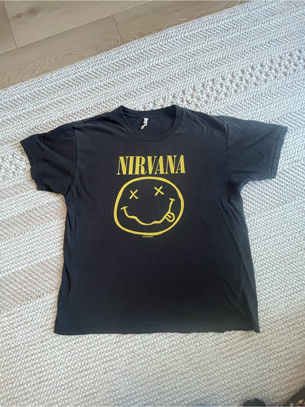 NIRVANA Black Tee with Yellow Smiley Logo